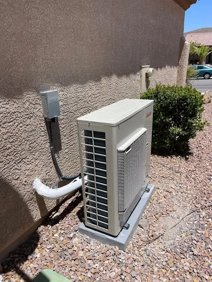 Residential air conditioning condenser unit in Rockaway